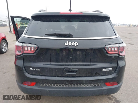 2018 Jeep Compass Altitude with VIN 3C4NJDBB9JT202297, listed as a IAAI auction lot 42020996 with 59,461 mi miles and . Bid and sale history available at DreamBid. Image 16.