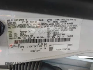 2012 Ford Focus SE with VIN 1FAHP3F24CL462319, listed as a IAAI auction lot 41981509 with 124,831 mi miles. Bid and sale history available at carsss.com. Image 9.