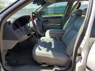 2001 Lincoln Town Car Cartier z VIN 1LNHM83W91Y728971, wystawiony jako Copart lot #50643965 z przebiegiem Nie podano mil oraz Szkoda całkowita • Salvage title. Historia ofert i sprzedaży dostępna na DreamBid. Obrazek 7.