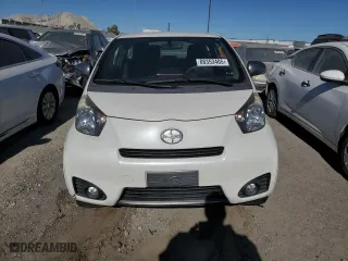 2015 Scion iQ with VIN JTNJJXB09FJ030846, listed as a Copart auction lot 88353405 with 72,208 mi miles and Salvage Title. Bid and sale history available at carsss.com. Image 5.