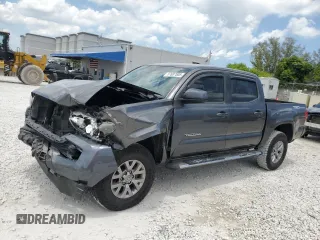 2018 Toyota Tacoma SR with VIN 5TFAX5GN5JX128645, listed as a Copart auction lot 57687505 with 79,770 mi miles and Salvage title. Bid and sale history available at DreamBid. Image 1.
