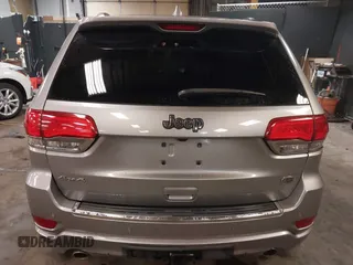2015 Jeep Grand Cherokee Overland with VIN 1C4RJFCG1FC215426, listed as a IAAI auction lot 41689821 with 128,563 mi miles. Bid and sale history available at carsss.com. Image 17.