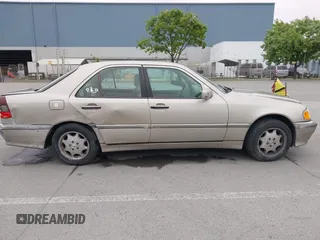 1999 Mercedes-Benz C 230/260/280/320 with VIN WDBHA29G8XA784619, listed as a IAAI auction lot 42120920 with 49,387 mi miles and . Bid and sale history available at DreamBid. Image 13.