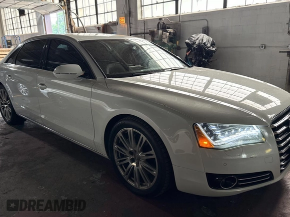 2014 Audi A8 3.0L TDI with VIN WAURMAFD2EN003811, listed as a Copart auction lot 61867575 with 120,705 mi miles and Clean title. Bid and sale history available at DreamBid. Image 1.