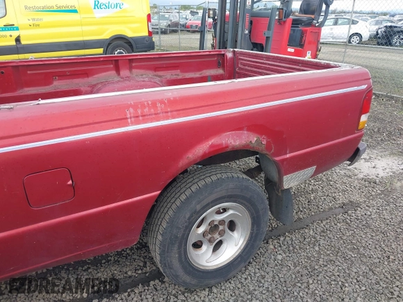 1997 Ford Ranger XLT with VIN 1FTCR10A4VUC65392, listed as a IAAI auction lot 41993646 with 208,789 mi miles. Bid and sale history available at carsss.com. Image 6.