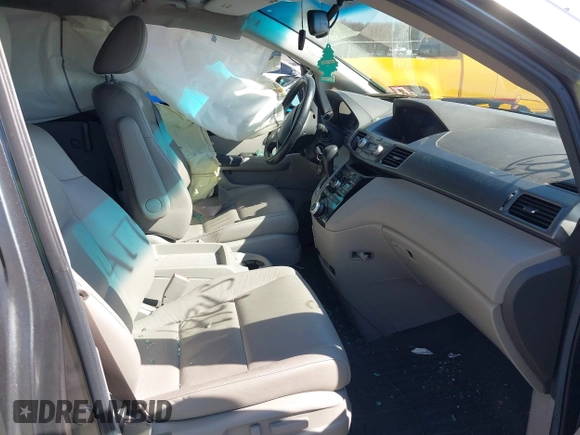 2011 Honda Odyssey EX-L with VIN 5FNRL5H60BB103430, listed as a IAAI auction lot 41752581 with 108,422 mi miles and . Bid and sale history available at carsss.com. Image 5.