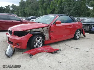 2012 BMW 1 Series 128i with VIN WBAUL7C52CVE87329, listed as a Copart auction lot 52867624 with 91,237 mi miles and Salvage Title. Bid and sale history available at carsss.com. Image 1.