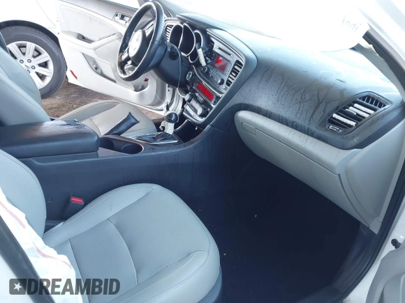2014 Kia Optima EX z VIN 5XXGN4A74EG294124, wystawiony jako IAAI lot #41413272 z przebiegiem 154 058 mil mil oraz . Historia ofert i sprzedaży dostępna na DreamBid. Obrazek 5.