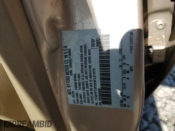 1999 Ford Escort SE z VIN 1FAFP13P2XW131979, wystawiony jako Copart lot #72522124 z przebiegiem 67 911 mil mil oraz Szkoda całkowita • Salvage title. Historia ofert i sprzedaży dostępna na DreamBid. Obrazek 12.