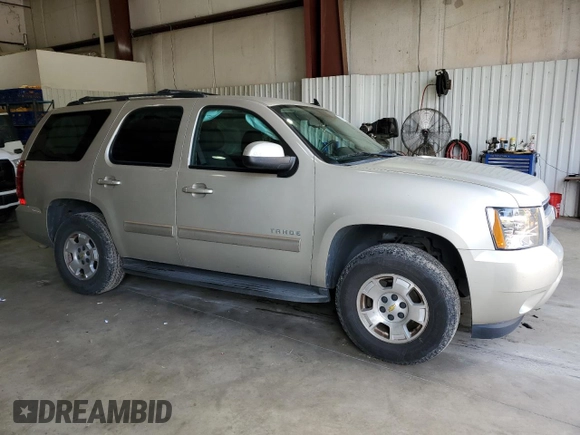 2013 Chevrolet Tahoe LS with VIN 1GNSCAE03DR212317, listed as a Copart auction lot 50511725 with 135,325 mi miles and Salvage title. Bid and sale history available at DreamBid. Image 4.