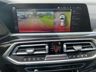 2021 BMW X7 M50i z VIN 5UXCX6C01M9D99785, wystawiony jako Copart lot #59682835 z przebiegiem 21 754 mil mil oraz Szkoda całkowita • Salvage title. Historia ofert i sprzedaży dostępna na DreamBid. Obrazek 9.