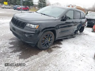 2020 Jeep Grand Cherokee Altitude with VIN 1C4RJFAG1LC225243, listed as a IAAI auction lot 41236515 with 93,343 mi miles. Bid and sale history available at carsss.com. Image 17.