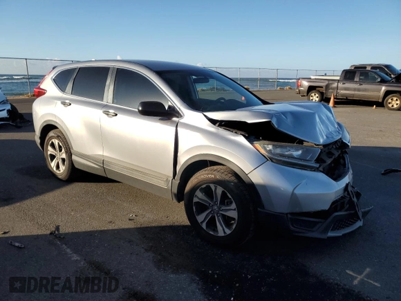 2018 Honda CR-V LX z VIN 2HKRW6H3XJH203604, wystawiony jako Copart lot #89002705 z przebiegiem 77 628 mil mil oraz Szkoda całkowita • Salvage title. Historia ofert i sprzedaży dostępna na DreamBid. Obrazek 4.