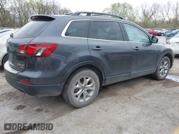 2015 Mazda CX-9 Touring with VIN JM3TB3CA3F0460864, listed as a IAAI auction lot 41944957 with 242,100 mi miles. Bid and sale history available at carsss.com. Image 4.