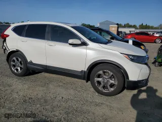 2018 Honda CR-V EX-L with VIN 2HKRW1H80JH516384, listed as a Copart auction lot 51940555 with 57,095 mi miles and Salvage Title. Bid and sale history available at carsss.com. Image 4.