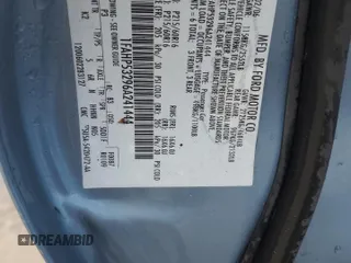 2006 Ford Taurus SE with VIN 1FAHP53296A241444, listed as a Copart auction lot 58343615 with 125,385 mi miles and Salvage title. Bid and sale history available at DreamBid. Image 12.