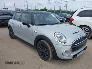 2016 MINI Hardtop 4 Door S z VIN WMWXU3C55G2B66752, wystawiony jako IAAI lot #42139464 z przebiegiem 86 289 mil mil oraz . Historia ofert i sprzedaży dostępna na DreamBid. Obrazek 1.