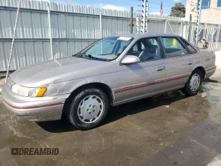 1995 Ford Taurus GL z VIN 1FALP5246SG150152, wystawiony jako Copart lot #48558355 z przebiegiem 123 902 mil mil oraz Szkoda całkowita • Salvage title. Historia ofert i sprzedaży dostępna na DreamBid. Obrazek 1.