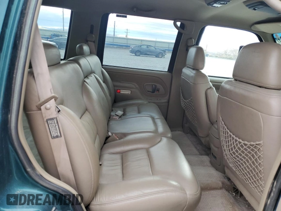 1996 GMC Yukon with VIN 1GKEK13R6TJ747606, listed as a Copart auction lot 80763434 with 308,837 mi miles and Salvage Title. Bid and sale history available at DreamBid. Image 11.