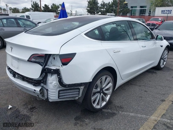 2018 Tesla Model 3 Long Range Battery with VIN 5YJ3E1EA6JF053052, listed as a IAAI auction lot 41765978 with 92,222 mi miles. Bid and sale history available at carsss.com. Image 4.