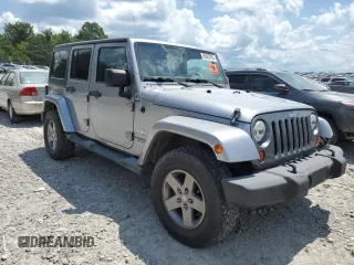 2013 Jeep Wrangler Unlimited Sport with VIN 1C4BJWDG4DL628518, listed as a Copart auction lot 65029795 with 142,852 mi miles and Salvage title. Bid and sale history available at DreamBid. Image 4.