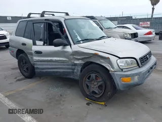 1999 Toyota RAV4 with VIN JT3GP10V8X7050999, listed as a IAAI auction lot 42187334 with 222,562 mi miles and . Bid and sale history available at DreamBid. Image 1.