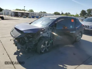 2021 Nissan LEAF SV with VIN 1N4AZ1CVXMC552736, listed as a Copart auction lot 63552015 with 54,660 mi miles and Clean title. Bid and sale history available at DreamBid. Image 1.