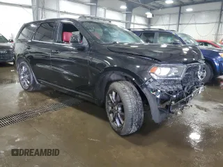 2015 Dodge Durango R/T with VIN 1C4SDJCT7FC843533, listed as a Copart auction lot 50249575 with 102,733 mi miles and Salvage Title. Bid and sale history available at carsss.com. Image 4.