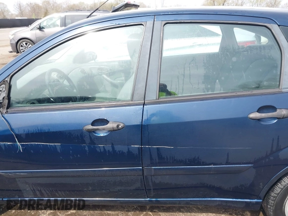 2004 Ford Focus ZX5 z VIN 3FAFP37334R120359, wystawiony jako IAAI lot #41922026 z przebiegiem 115 789 mil mil oraz . Historia ofert i sprzedaży dostępna na DreamBid. Obrazek 14.