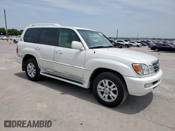 2004 Lexus LX 470 z VIN JTJHT00W743542910, wystawiony jako Copart lot #57187445 z przebiegiem 236 985 mil mil oraz Szkoda całkowita • Salvage title. Historia ofert i sprzedaży dostępna na DreamBid. Obrazek 4.
