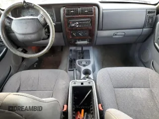 1997 Jeep Cherokee Country with VIN 1J4FJ78SXVL566804, listed as a Copart auction lot 88557395 with 216,230 mi miles and Salvage title. Bid and sale history available at DreamBid. Image 8.