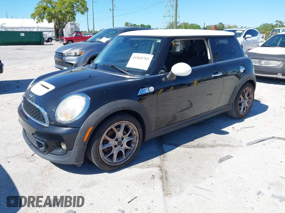 2011 MINI Hardtop S with VIN WMWSV3C5XBTY22399, listed as a IAAI auction lot 41868705 with 134,516 mi miles and . Bid and sale history available at DreamBid. Image 2.