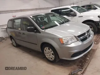 2014 Dodge Grand Caravan SE with VIN 2C4RDGBG1ER420913, listed as a IAAI auction lot 41993426 with 277,805 mi miles and . Bid and sale history available at DreamBid. Image 1.