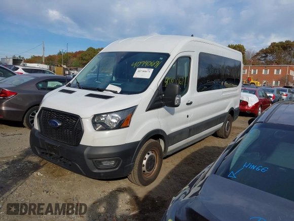 2023 Ford Transit Cargo with VIN 1FTBR1C86PKA52494, listed as a IAAI auction lot 40740671 with 9,999 mi miles and . Bid and sale history available at DreamBid. Image 19.