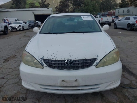 2004 Toyota Camry LE with VIN 4T1BF32K84U065969, listed as a IAAI auction lot 41936434 with 198,886 mi miles. Bid and sale history available at carsss.com. Image 6.