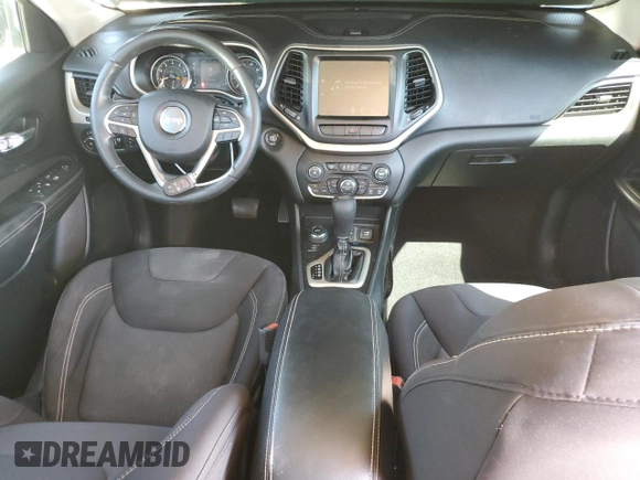 2015 Jeep Cherokee Latitude with VIN 1C4PJMCS6FW558716, listed as a Copart auction lot 50702375 with 133,088 mi miles and Salvage Title. Bid and sale history available at DreamBid. Image 8.