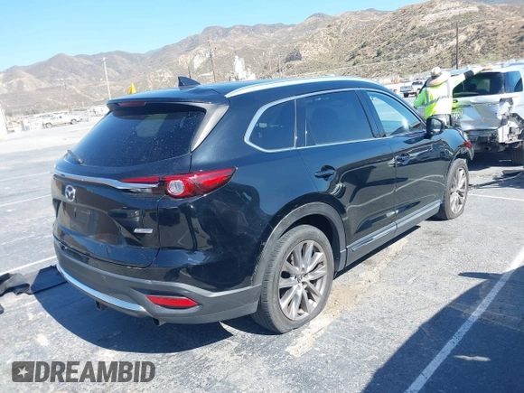 2017 Mazda CX-9 Grand Touring with VIN JM3TCBDY0H0130671, listed as a IAAI auction lot 42514237 with 81,016 mi miles and . Bid and sale history available at DreamBid. Image 4.