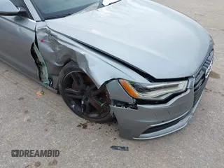 2015 Audi A6 3.0T Premium Plus with VIN WAUFGAFC9FN047047, listed as a IAAI auction lot 41328488 with 83,840 mi miles. Bid and sale history available at carsss.com. Image 6.