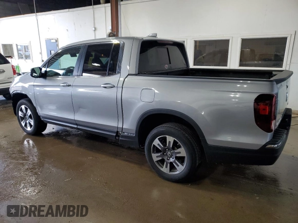 2019 Honda Ridgeline RTL-T with VIN 5FPYK3F60KB009495, listed as a Copart auction lot 61578405 with 90,586 mi miles and Salvage title. Bid and sale history available at DreamBid. Image 2.