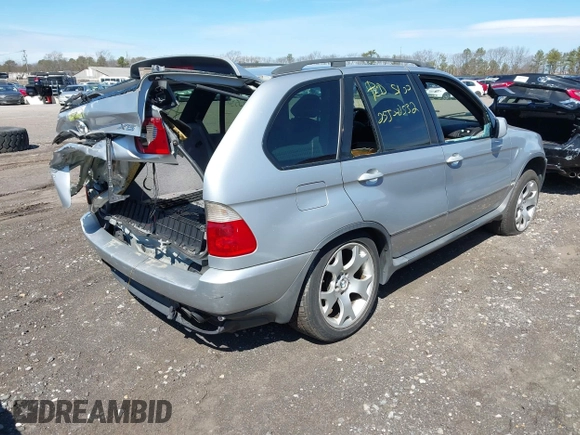 2001 BMW X5 4.4i with VIN WBAFB33501LH11081, listed as a IAAI auction lot 41911648 with 999,999 mi miles. Bid and sale history available at carsss.com. Image 4.