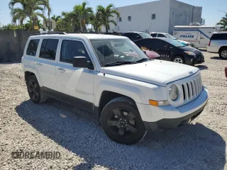 2014 Jeep Patriot Latitude with VIN 1C4NJPFB5ED529903, listed as a Copart auction lot 47980455 with 90,418 mi miles and Salvage Title. Bid and sale history available at carsss.com. Image 4.