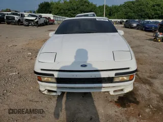 1990 Ford Probe GL z VIN 1ZVPT20CXL5212307, wystawiony jako Copart lot #54941994 z przebiegiem 241 227 mil mil oraz Szkody całkowita. Historia ofert i sprzedaży dostępna na DreamBid. Obrazek 5.