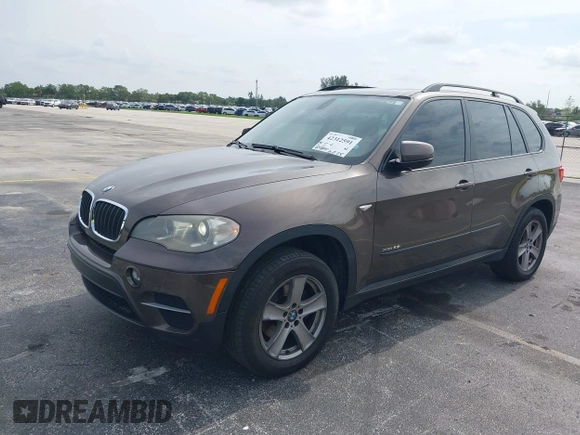 2012 BMW X5 35i z VIN 5UXZV4C53CL991140, wystawiony jako IAAI lot #42312591 z przebiegiem 115 875 mil mil oraz . Historia ofert i sprzedaży dostępna na DreamBid. Obrazek 18.