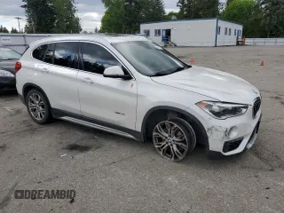 2016 BMW X1 xDrive28i z VIN WBXHT3C30G5E54396, wystawiony jako Copart lot #56042815 z przebiegiem 101 632 mil mil oraz Szkoda całkowita • Salvage title. Historia ofert i sprzedaży dostępna na DreamBid. Obrazek 4.