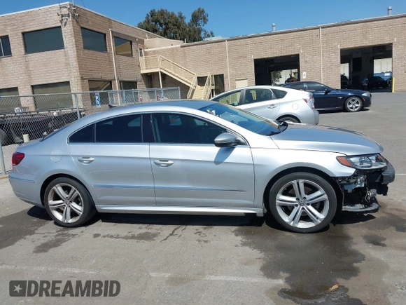 2014 Volkswagen CC R-Line with VIN WVWBP7AN0EE527649, listed as a IAAI auction lot 42009588 with 122,964 mi miles. Bid and sale history available at carsss.com. Image 14.
