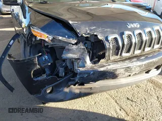 2015 Jeep Cherokee Latitude with VIN 1C4PJLCB7FW632624, listed as a IAAI auction lot 41413648 with 110,274 mi miles. Bid and sale history available at carsss.com. Image 6.