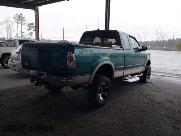 1997 Ford F-150 XL with VIN 1FTDX18W9VKC62901, listed as a IAAI auction lot 41495680 with 205,443 mi miles. Bid and sale history available at carsss.com. Image 4.