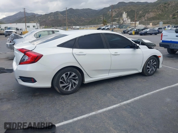 2018 Honda Civic EX with VIN 19XFC2F76JE206191, listed as a IAAI auction lot 41949231 with 146,118 mi miles and . Bid and sale history available at DreamBid. Image 13.