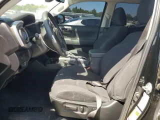 2023 Toyota Tacoma SR z VIN 3TMCZ5AN5PM533379, wystawiony jako Copart lot #55554265 z przebiegiem 31 776 mil mil oraz Szkoda całkowita • Salvage title. Historia ofert i sprzedaży dostępna na DreamBid. Obrazek 7.