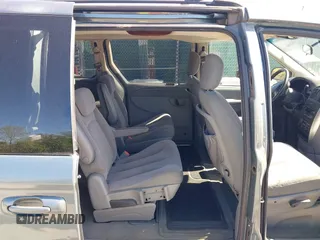 2007 Chrysler Town & Country LWB Touring with VIN 2A4GP54L47R167189, listed as a IAAI auction lot 42143590 with 165,547 mi miles. Bid and sale history available at carsss.com. Image 8.